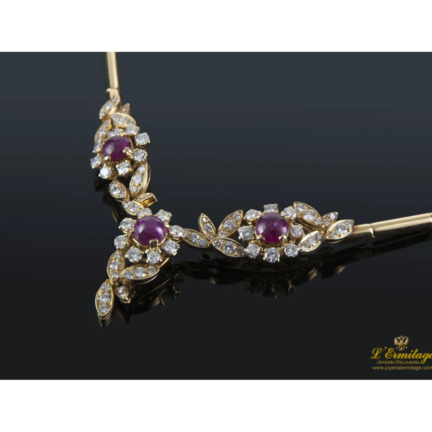 COLLARES Gargantilla oro amarillo rubíes y diamantes.
