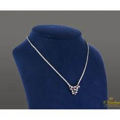 COLLARES Gargantilla oro blanco rubíes y diamantes.