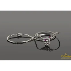 COLLARES Gargantilla oro blanco rubíes y diamantes.