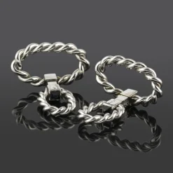 GEMELOS Gemelos cartier oro blanco trenzados.
