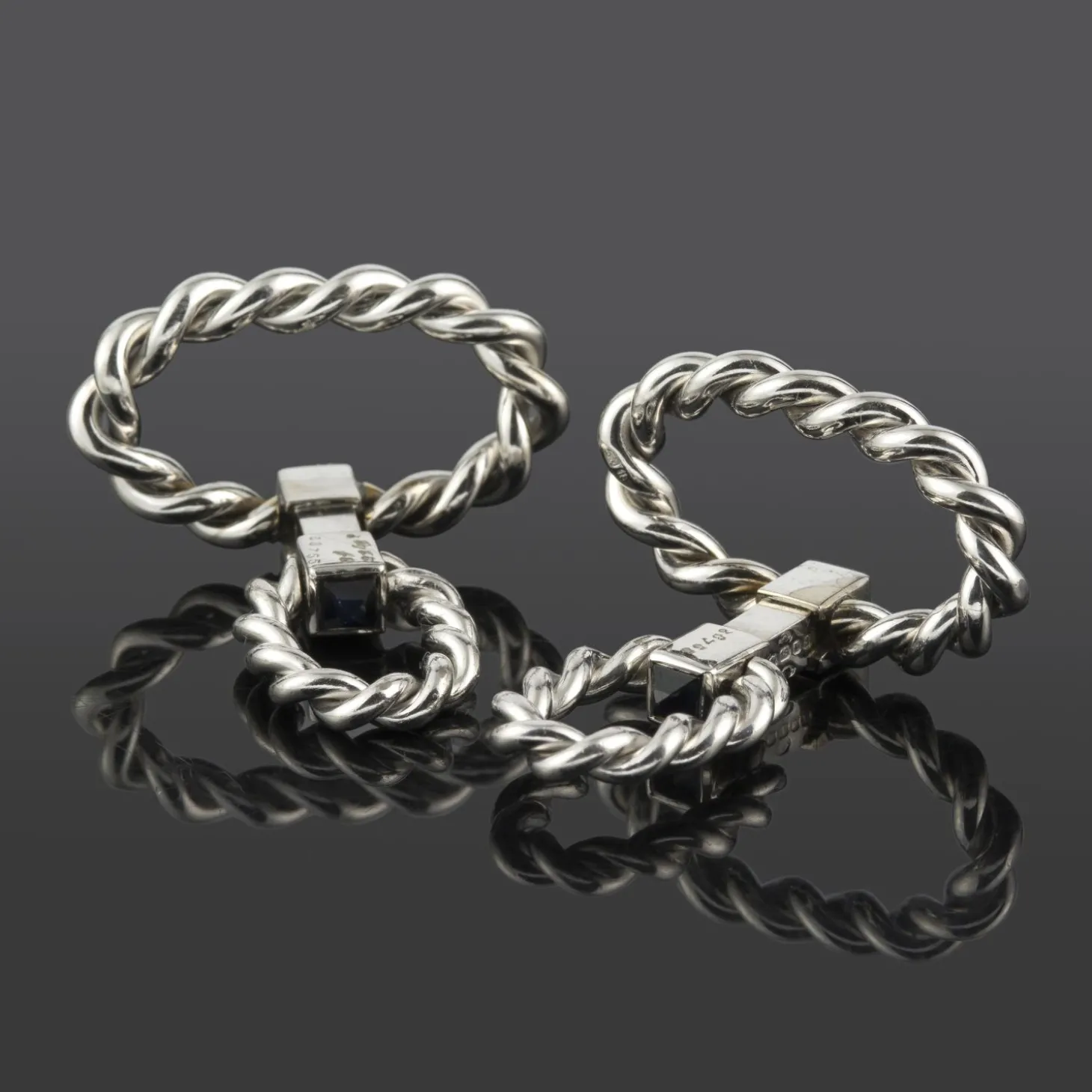 GEMELOS Gemelos cartier oro blanco trenzados.