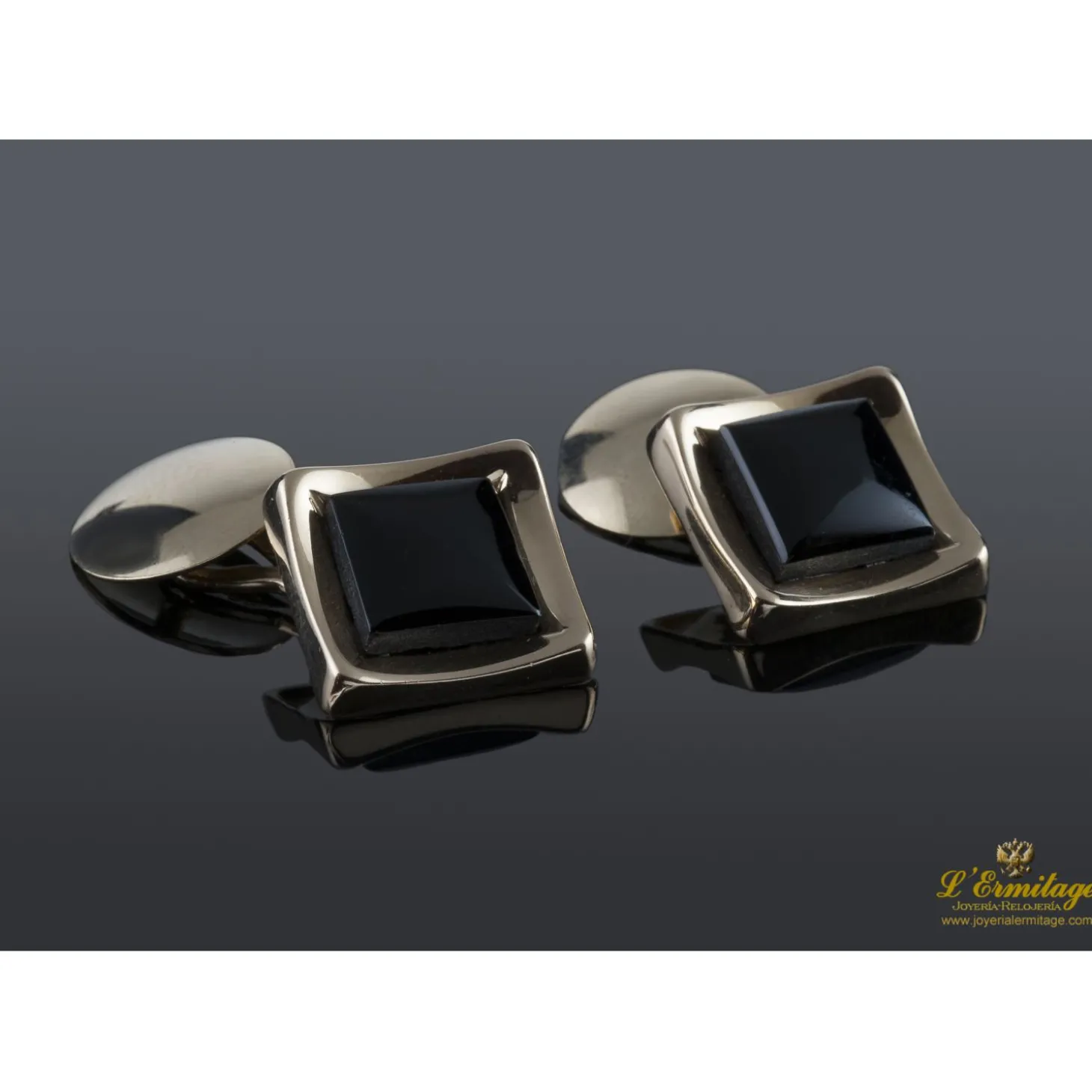 GEMELOS Gemelos realizados en oro amarillo y motivos con onix