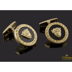 GEMELOS Gemelos tipo versace realizados en oro amarillo con centro en onix.
