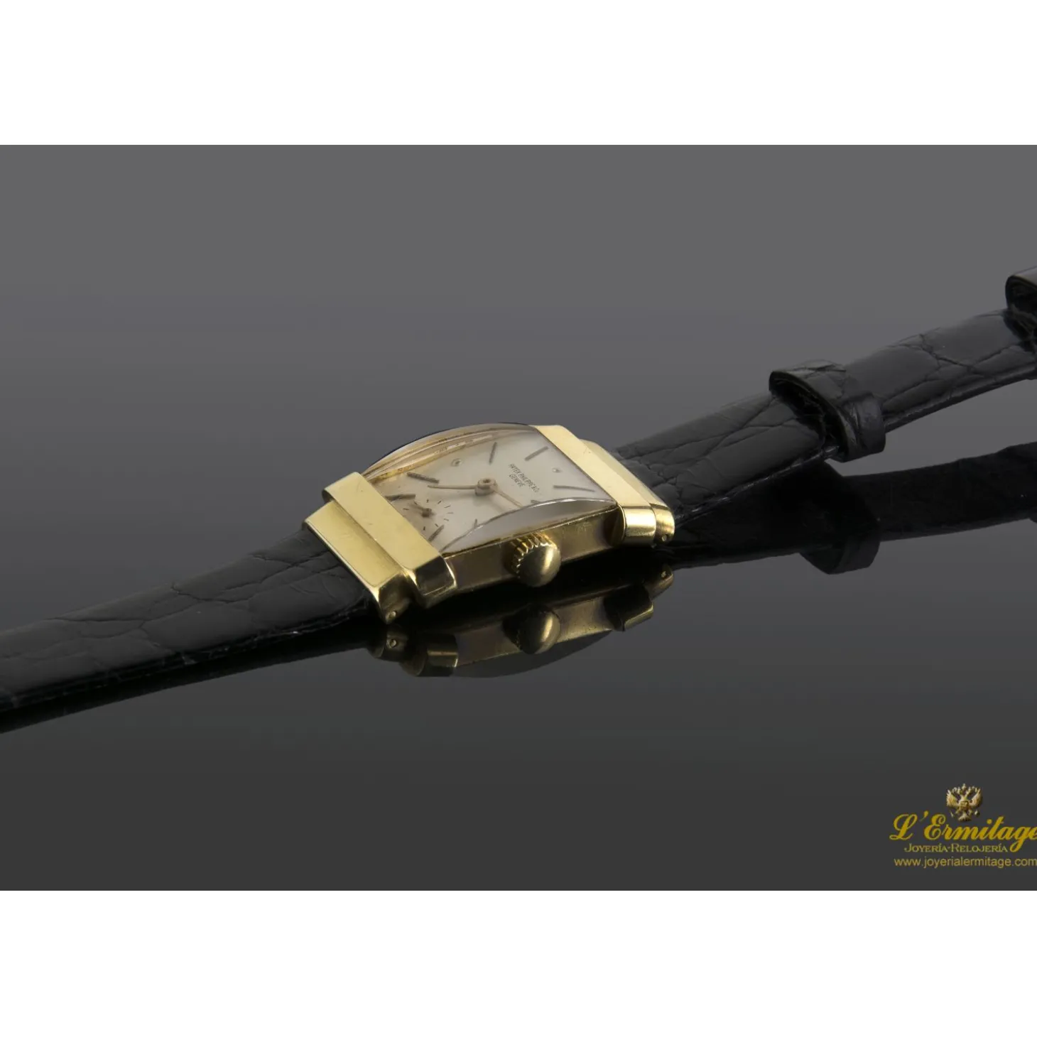 PATEK PHILIPPE Top hat oro amarillo cuerda manual.