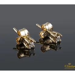 PENDIENTES Dependientes realizados en oro amarillo con brillantes.