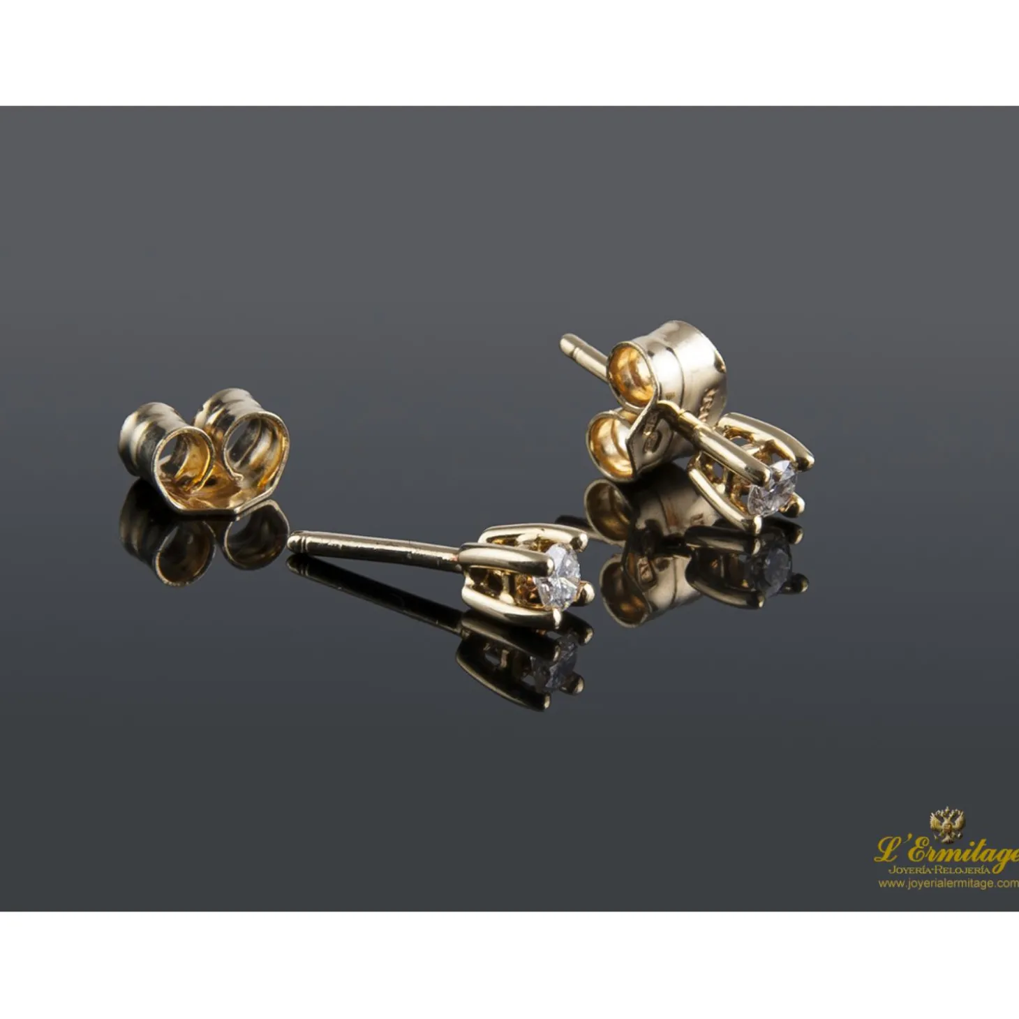 PENDIENTES Dependientes realizados en oro amarillo con brillantes.