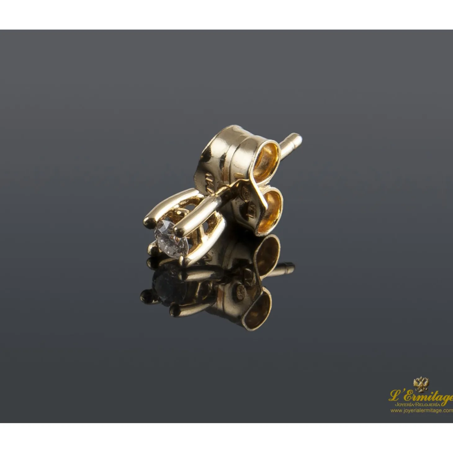 PENDIENTES Dependientes realizados en oro amarillo con brillantes.