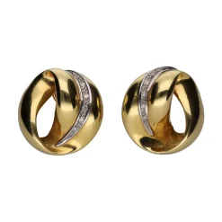PENDIENTES Pendientes circulares en oro amarillo y brillantes.