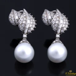 PENDIENTES Pendientes colgantes oro blanco diamantes y perlas australianas.