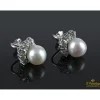 PENDIENTES Pendientes de perlas naturales realizados en oro blanco con medialuna de brillantes.