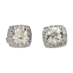 PENDIENTES Pendientes dormilonas en oro blanco y brillantes.