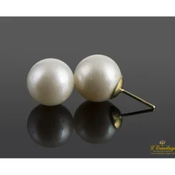 PENDIENTES Pendientes dormilonas de perlas montadas en oro amarillo.