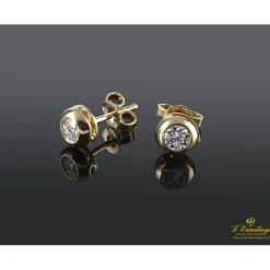 PENDIENTES Pendientes dormilonas oro amarillo y diamantes.