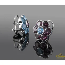 PENDIENTES Pendientes en forma de flor realizados en oro blanco. Presenta amatistas y topacios.