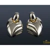 PENDIENTES Pendientes en forma de hoja realizados en oro amarillo.