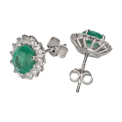 PENDIENTES Pendientes en oro blanco con esmeraldas y orla de brillantes.
