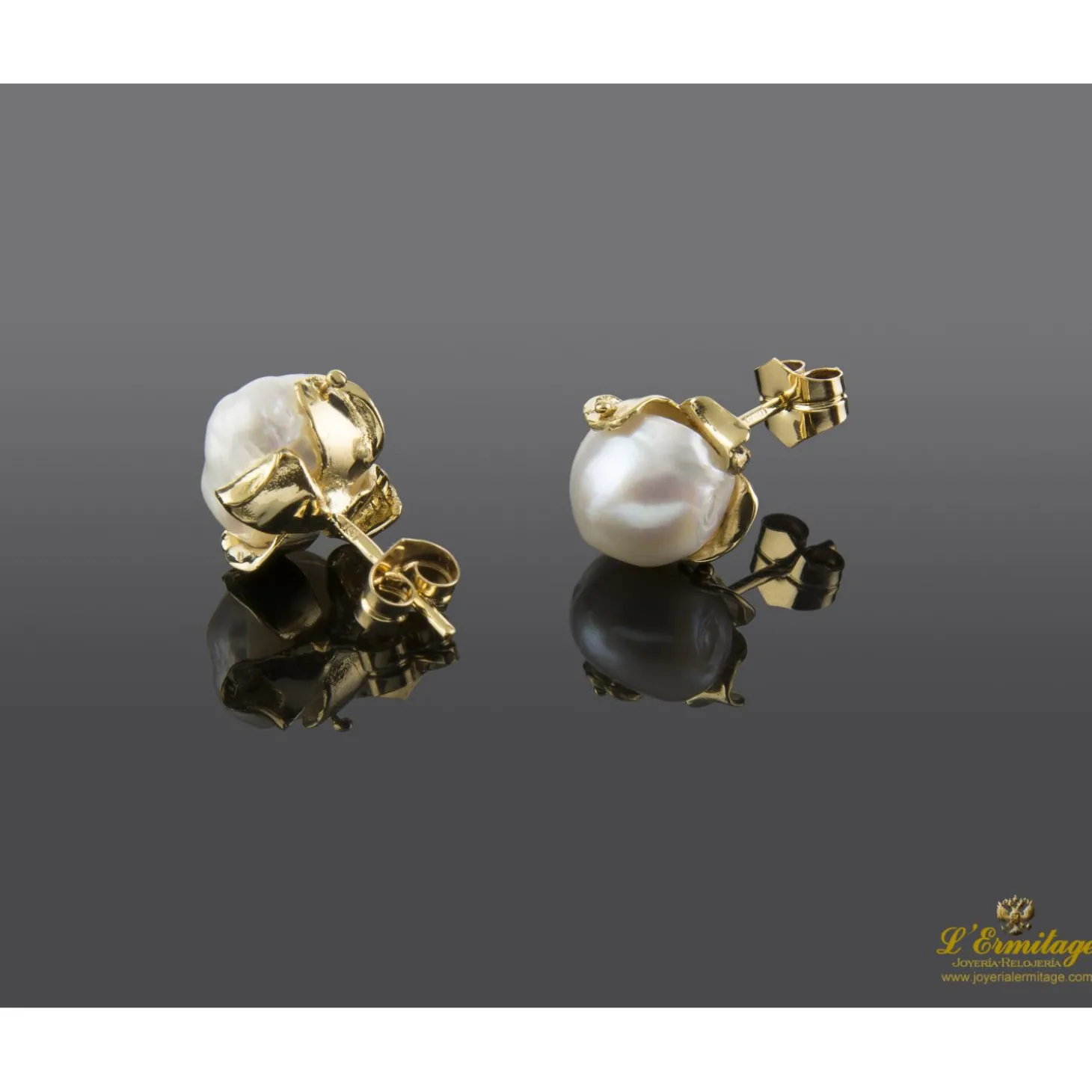 PENDIENTES Pendientes en oro amarillo y perlas barrocas