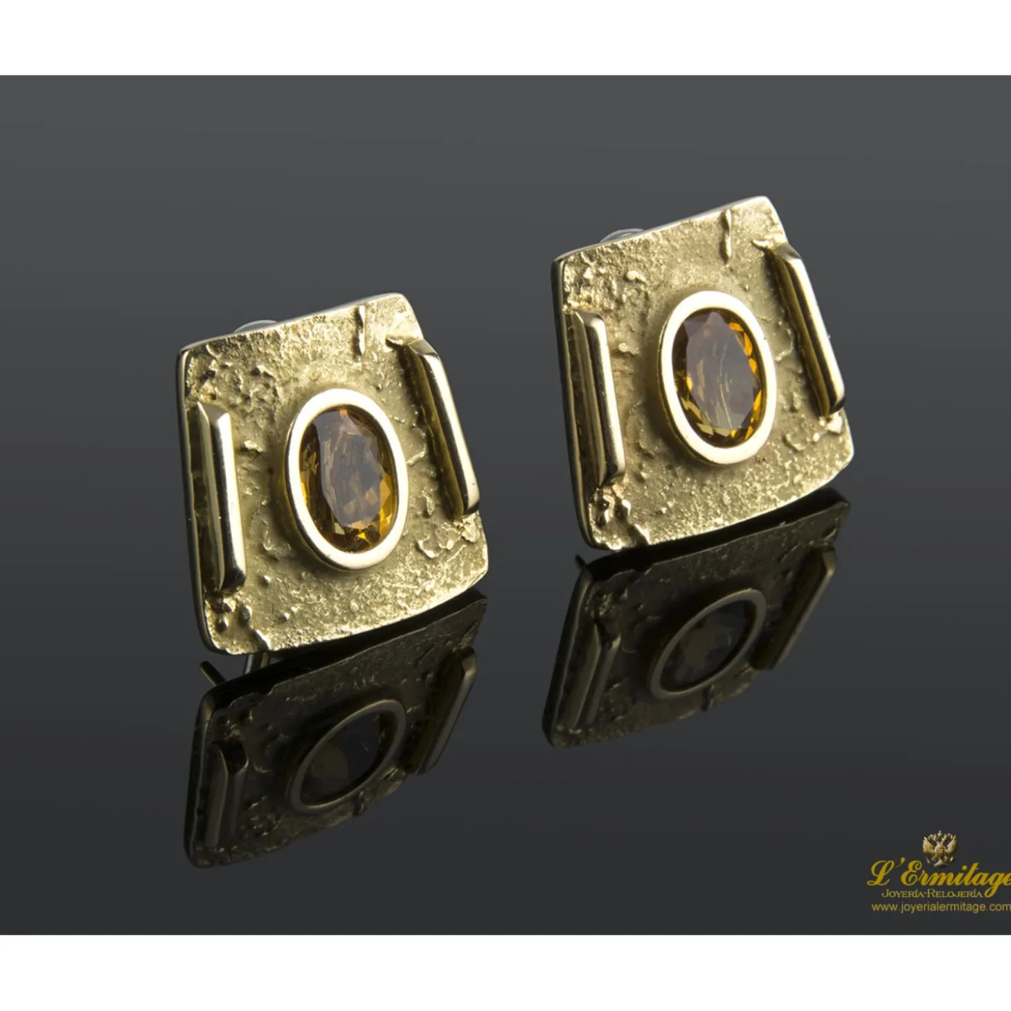 PENDIENTES Pendientes en oro amarillo con topacios