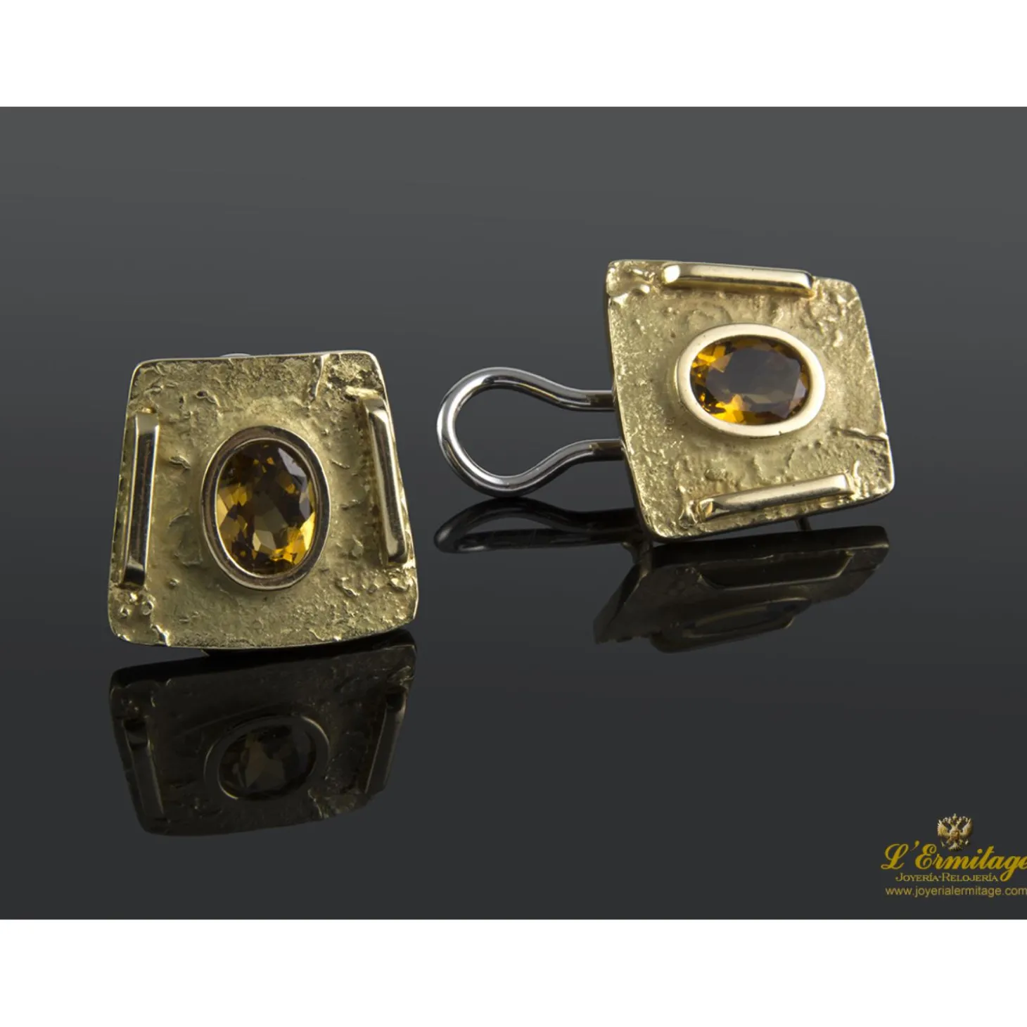 PENDIENTES Pendientes en oro amarillo con topacios