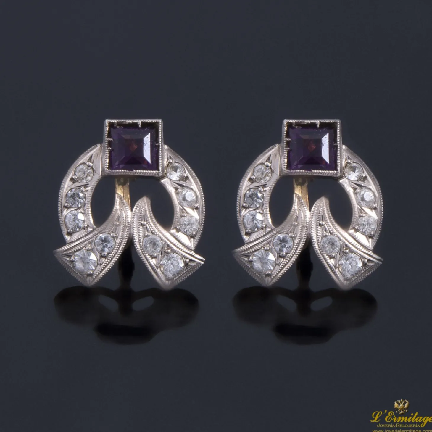 PENDIENTES Pendientes en oro amarillo y oro blanco con amatistas y circonitas.