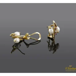 PENDIENTES Pendientes en oro amarillo con perlas rubíes y brillantes.