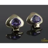 PENDIENTES Pendientes en oro amarillo y oro blanco con amatistas.