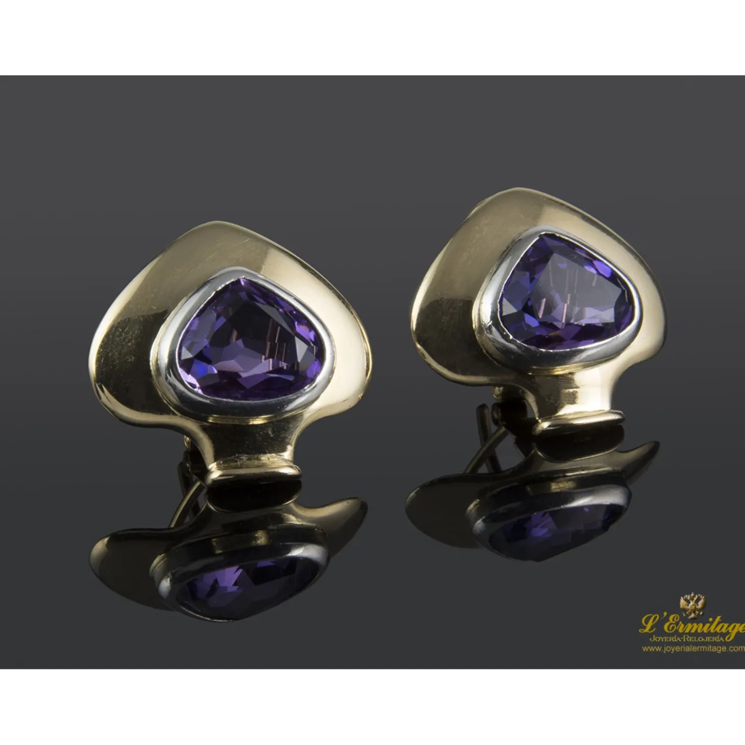 PENDIENTES Pendientes en oro amarillo y oro blanco con amatistas.
