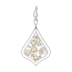 PENDIENTES Pendientes largos en oro blanco con diamantes blancos y amarillos.