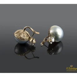 PENDIENTES Pendientes oro amarillo media perla tahití y diamante.