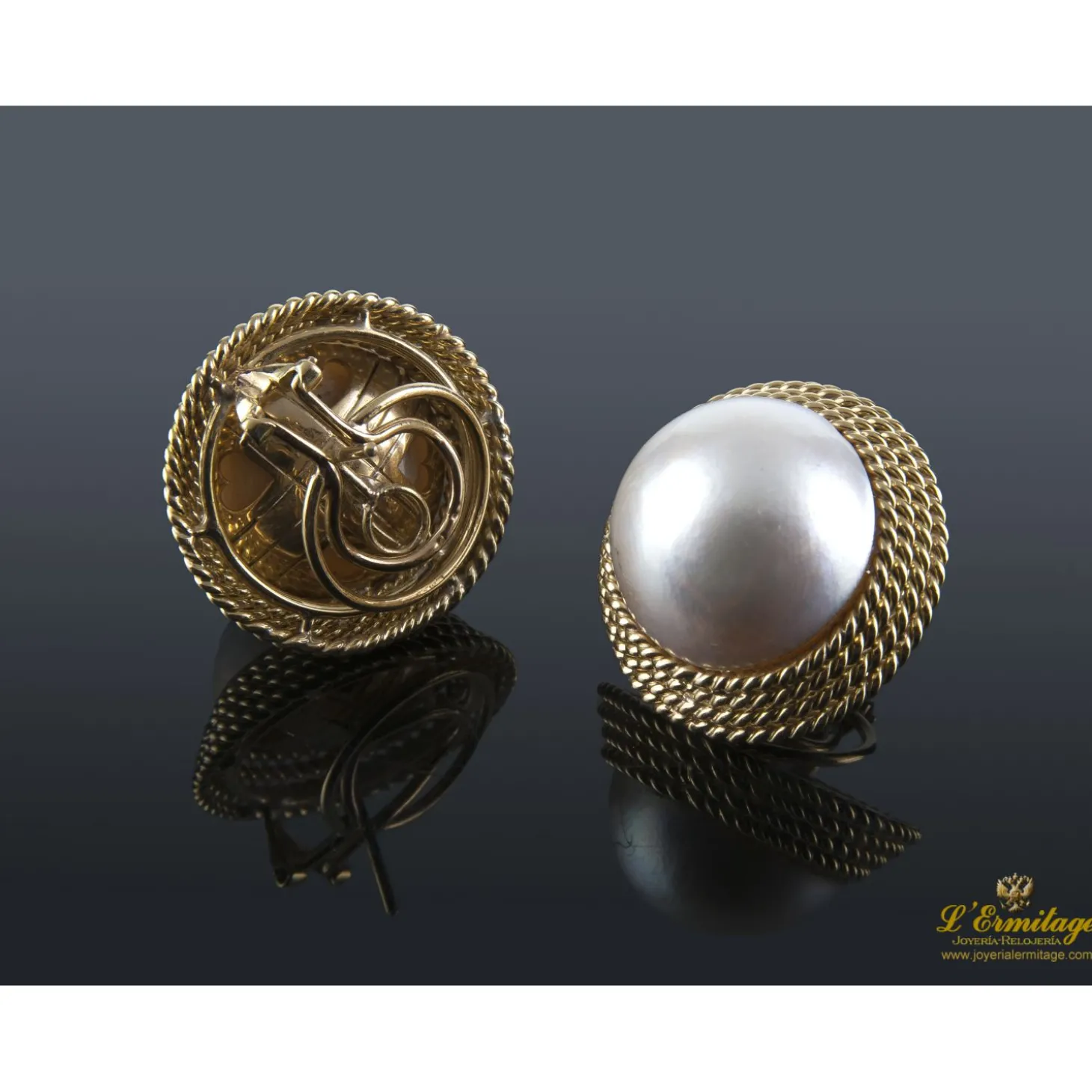PENDIENTES Pendientes oro amarillo trenzado y media perla.