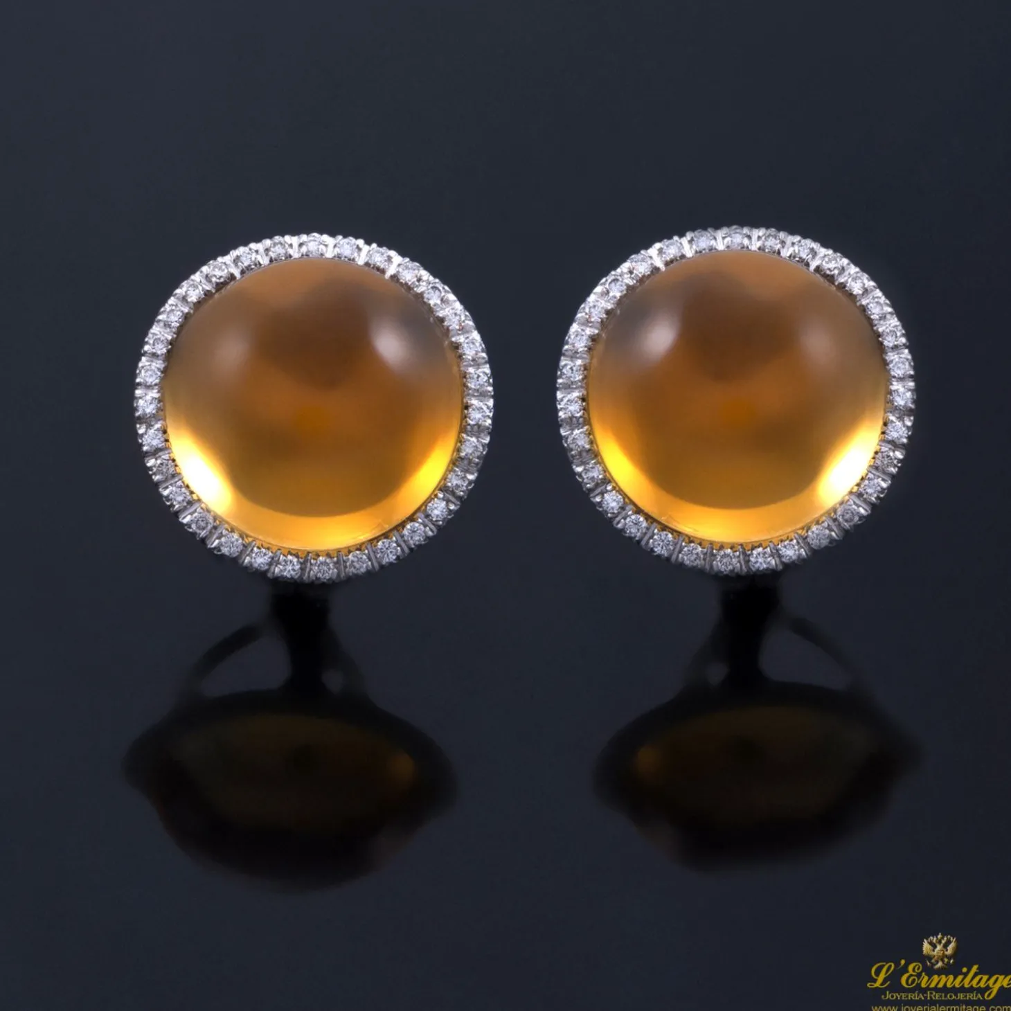 PENDIENTES Pendientes oro blanco topacios y diamantes.
