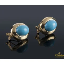 PENDIENTES Pendientes realizados en oro amarillo y turquesas.