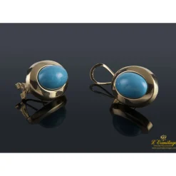 PENDIENTES Pendientes realizados en oro amarillo y turquesas.