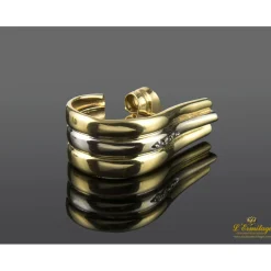PENDIENTES Pendientes realizados en oro amarillo y oro blanco con fila de zirconitas.