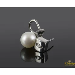 PENDIENTES Pendientes realizados en oro blanco con perlas y brillantes.