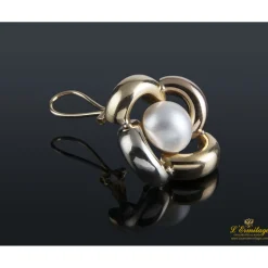 PENDIENTES Pendientes realizados en oro amarillo. Presentan dos perlas mabe.