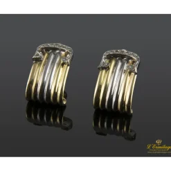 PENDIENTES Pendientes realizados en oro amarillo y oro blanco con motivo de brillantes.