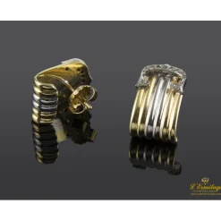 PENDIENTES Pendientes realizados en oro amarillo y oro blanco con motivo de brillantes.