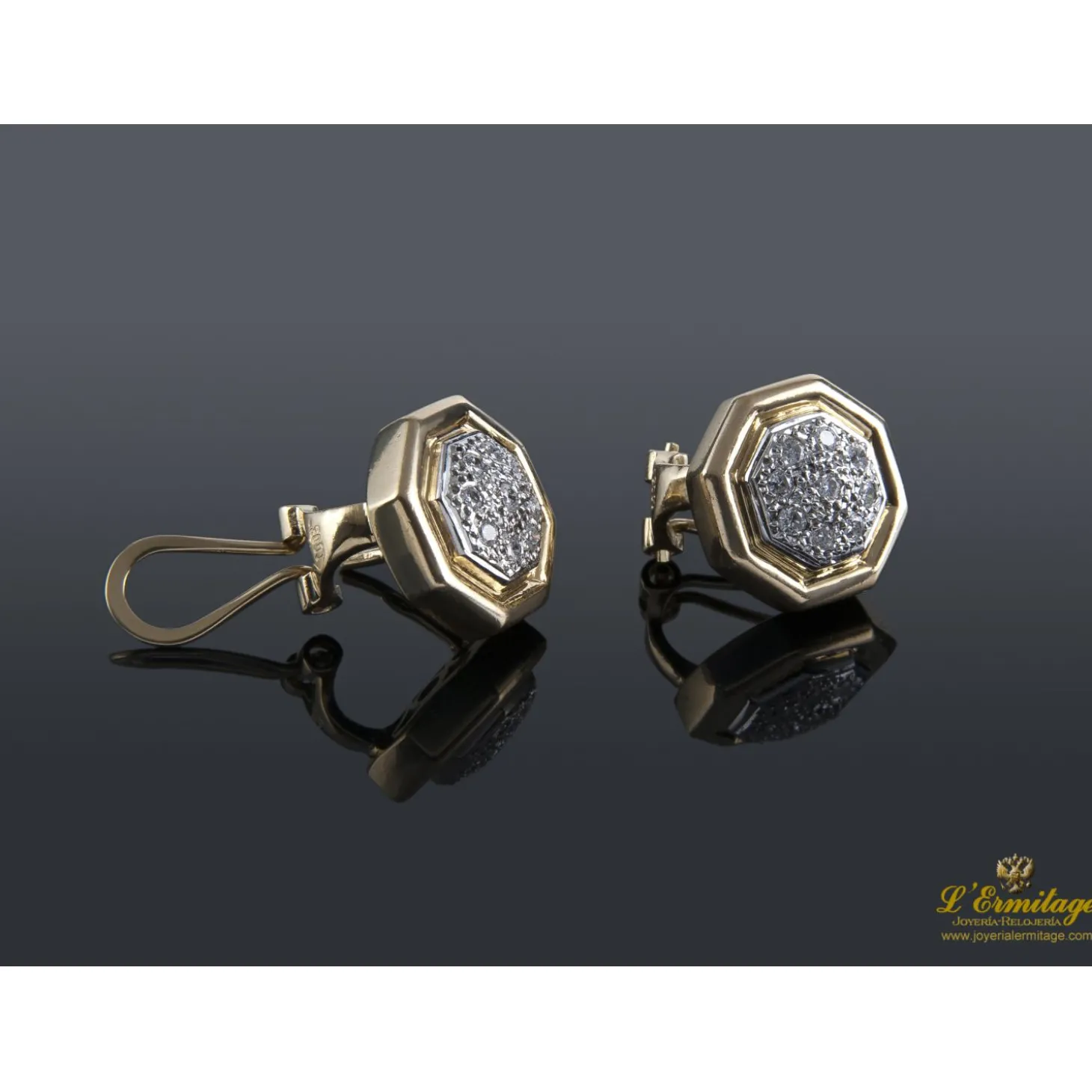 PENDIENTES Pendientes realizados en oro amarillo y brillantes.