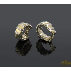 PENDIENTES Pendientes realizados en oro amarillo y oro blanco.