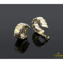 PENDIENTES Pendientes realizados en oro amarillo y oro blanco.