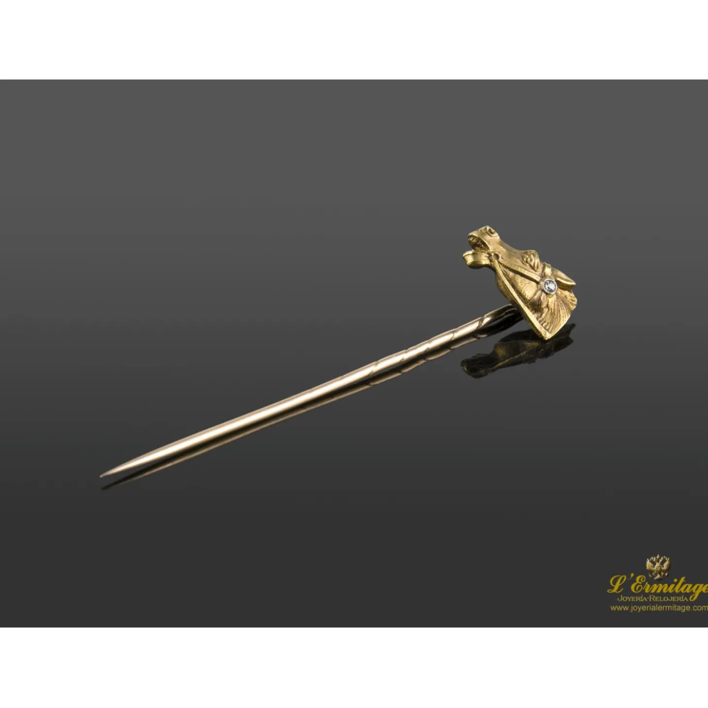 PISACORBATAS Alfiler de corbata realizado en oro amarillo y brillante.