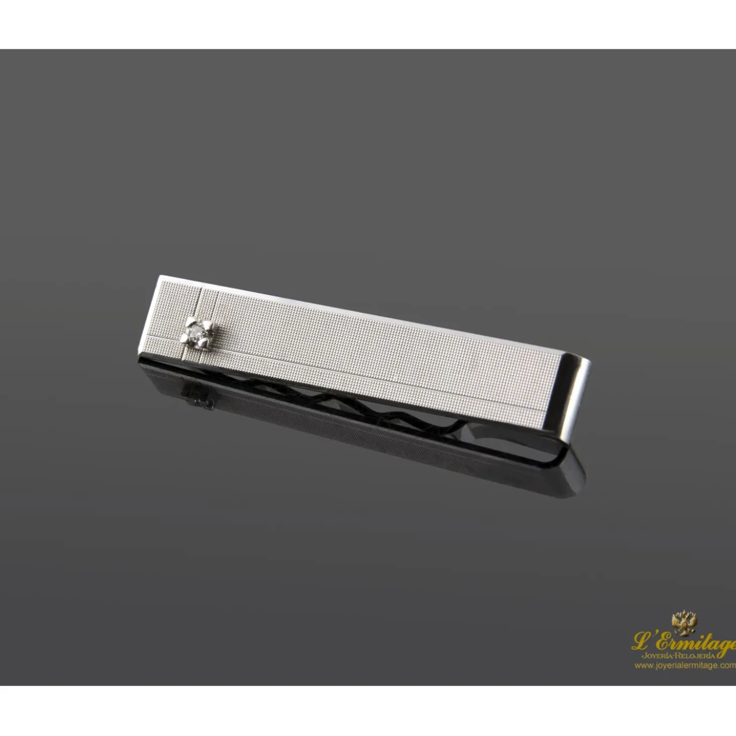 PISACORBATAS Pasador de corbata oro blanco y diamante.