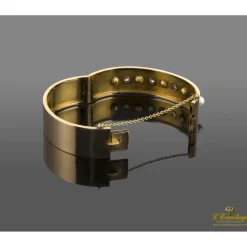 PULSERAS Pulsera antigua rígida oro amarillo perlas y diamantes.