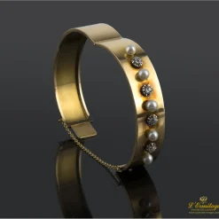 PULSERAS Pulsera antigua rígida oro amarillo perlas y diamantes.