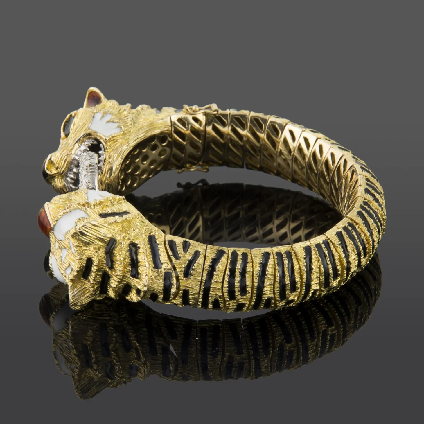 PULSERAS Pulsera articulada semirigida tigres oro amarillo y esmalte.