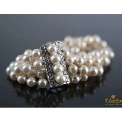 PULSERAS Pulsera cuatro hilos perlas naturales. 18Cm largo.