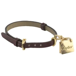 PULSERAS Pulsera cuero cartier con adorno de bolso en oro amarillo
