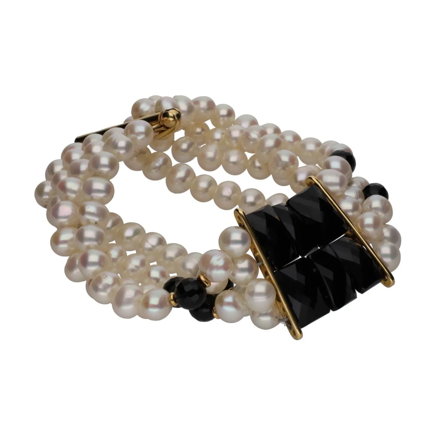 PULSERAS Pulsera de cuatro filas de perlas y ónix en oro amarillo.