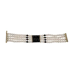 PULSERAS Pulsera de cuatro filas de perlas y ónix en oro amarillo.